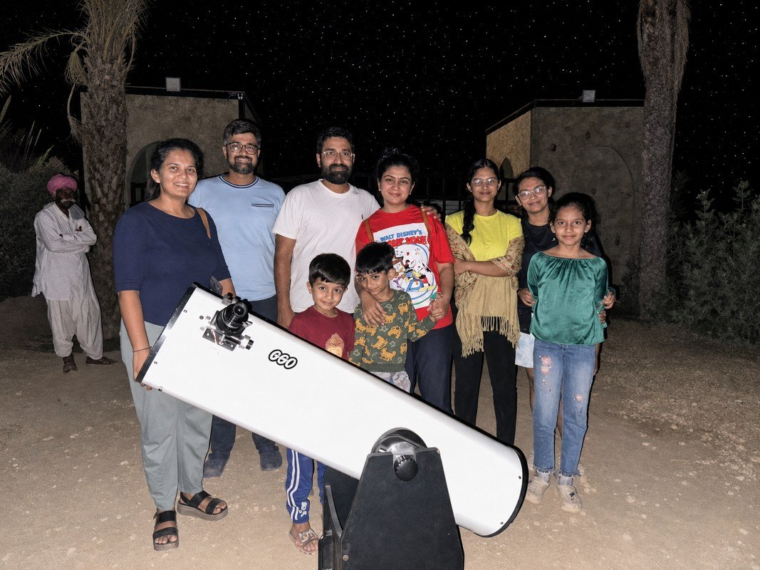 Guests enjoying telescope stargazing in Jaisalmer with Shrinath Adventures